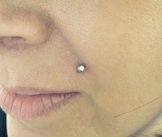 monroe piercing scar after taking out