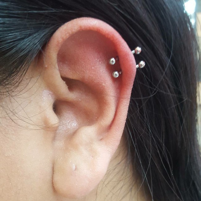 Double helix sale bar piercing