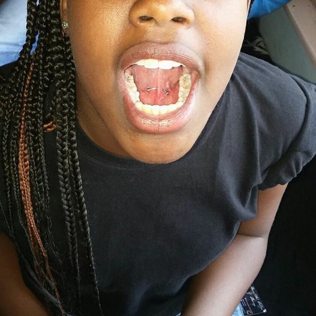 under tongue piercing on black girl
