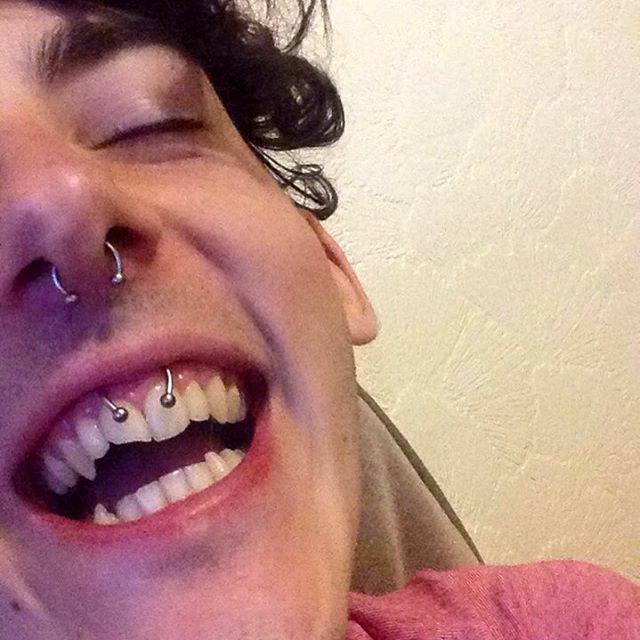 male smiley piercing image