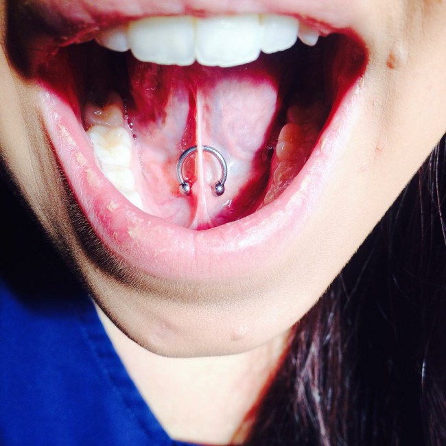 tongue web piercing image horseshoe jewelry
