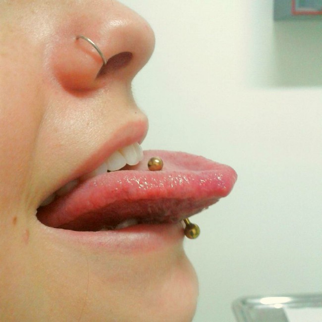 Tongue piercing what does mean a Purple Tongue