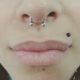 monroe lip piercing