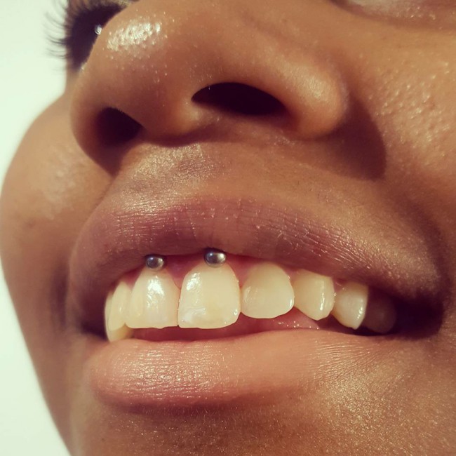 smiley lip piercing black girl