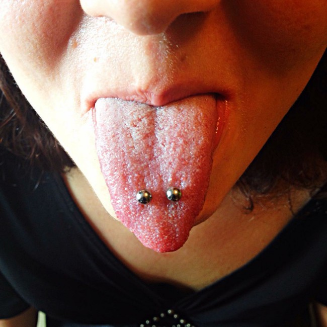 double horizontal tongue piercing