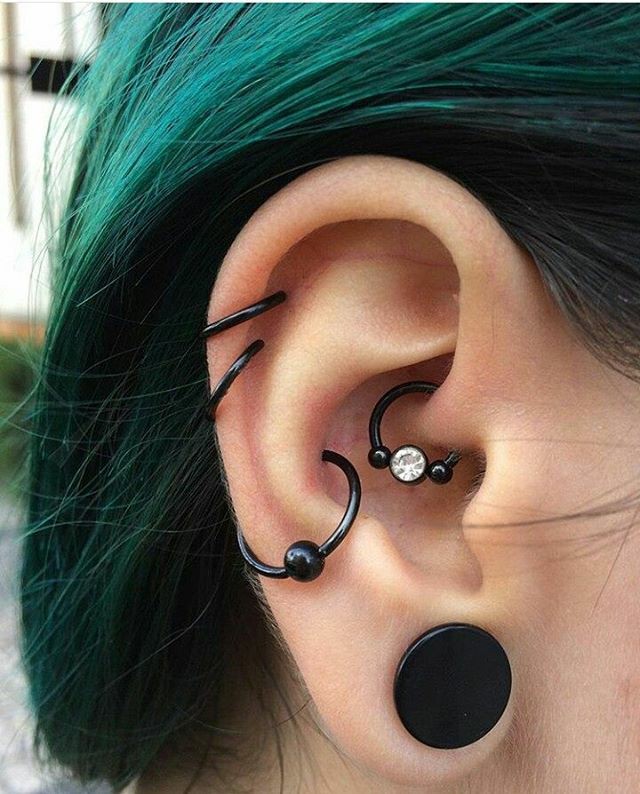 Helix piercing: pain, healing, jewelry - obsidian piercing