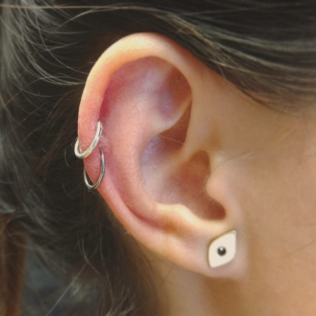 Helix piercing: pain, healing, jewelry - obsidian piercing