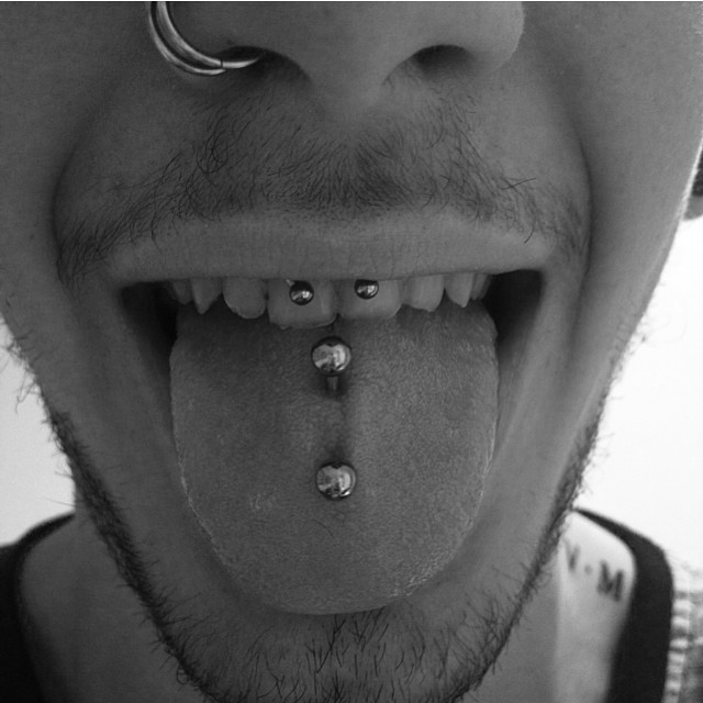 double tongue piercing on men