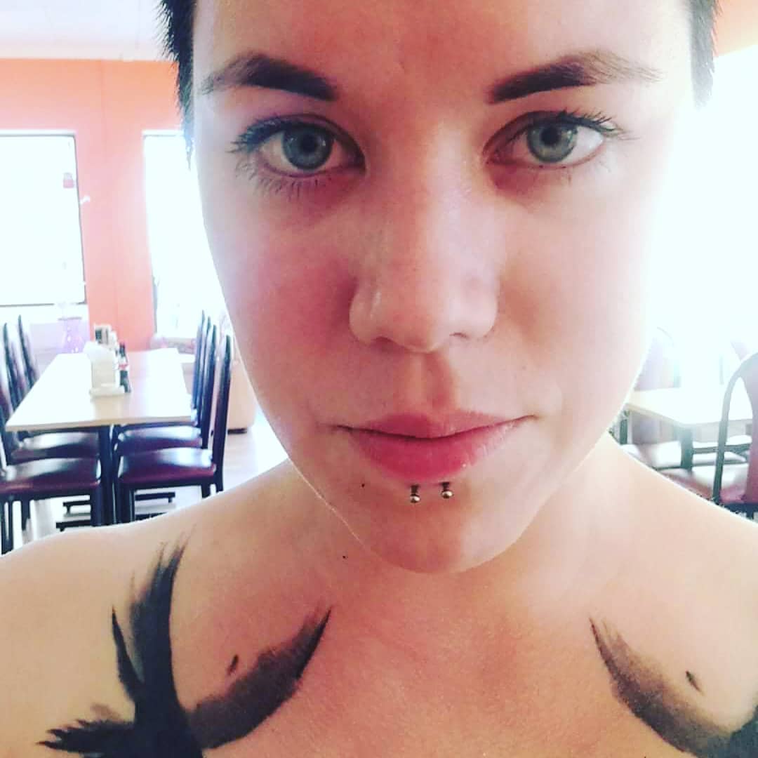 dolphin bite lip piercing