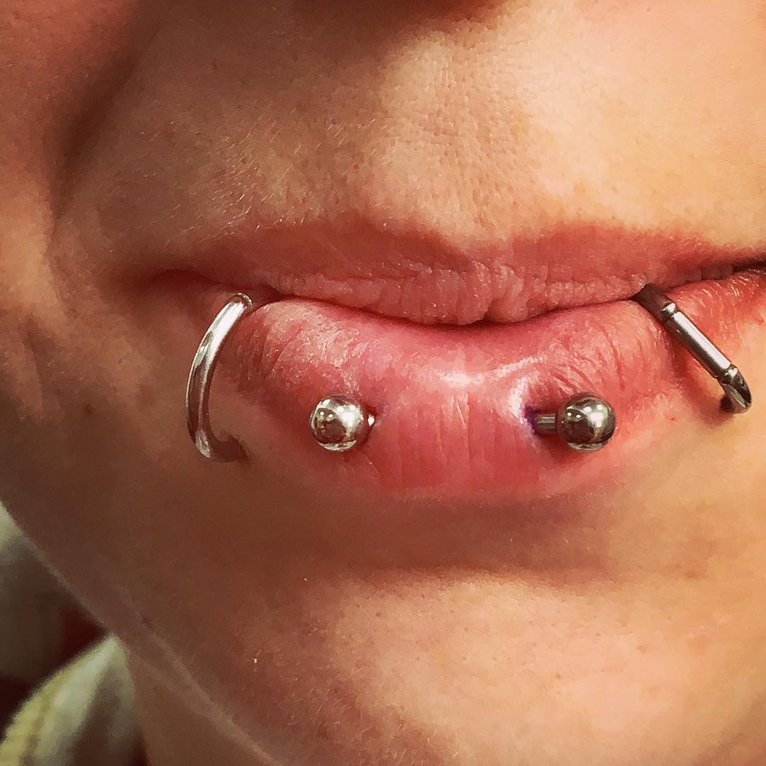 straight barbell horizontal lip piercing