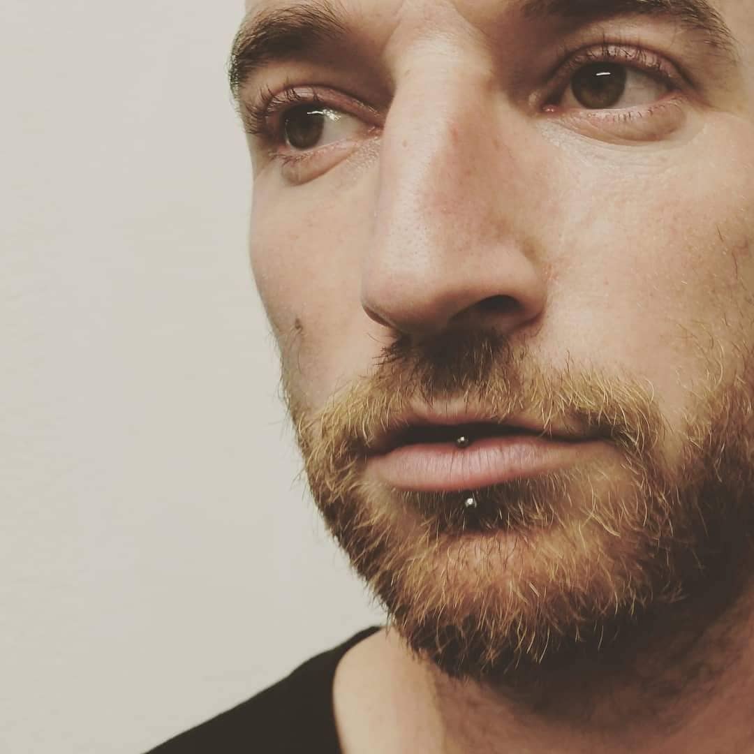 vertical labret jewelry on men