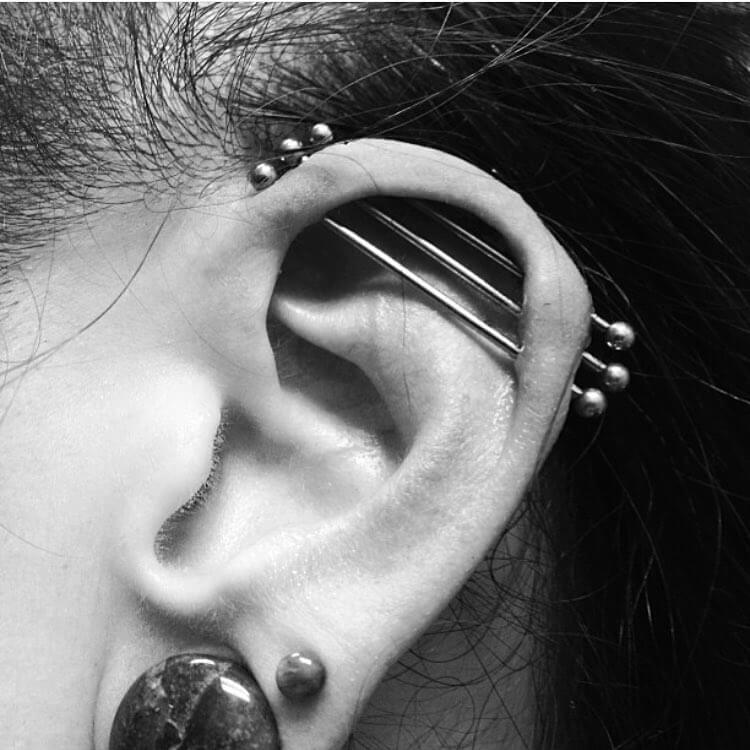 triple industrial ear piercing